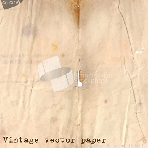 Image of Vintage paper background with grunge texture and holes