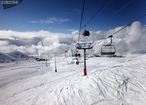 Image of Gondola and chair lift at ski resort