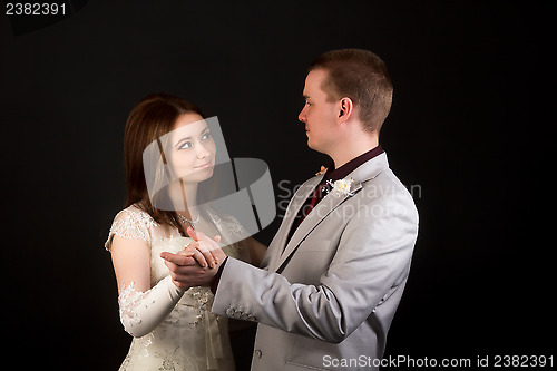 Image of Happy newlyweds dancing