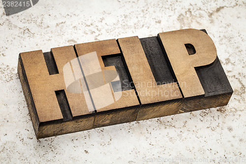 Image of help word  in wood type