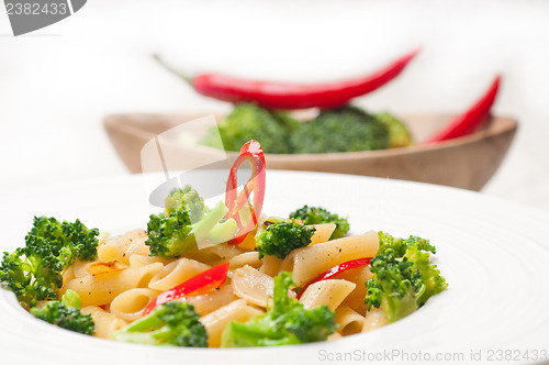 Image of Italian penne pasta with broccoli and chili pepper