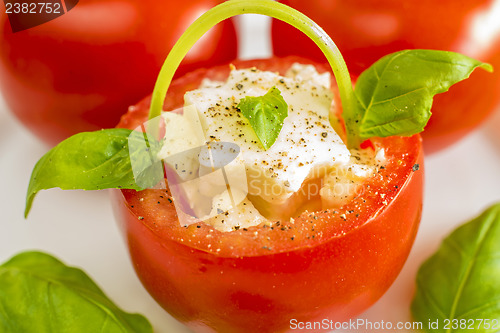 Image of tomato basket with mozarella