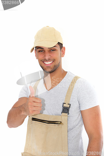Image of Confident workman giving a thumbs up