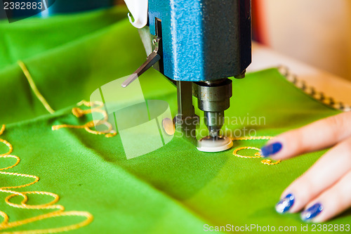 Image of Lady hand at sewing