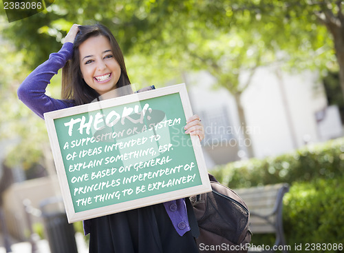 Image of Mixed Race Female Student Holding Chalkboard With Theory and Def