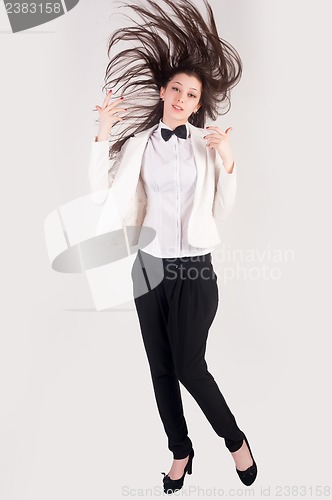 Image of Business woman with flying hair
