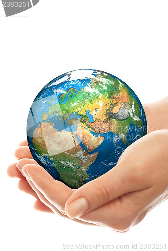 Image of Hand of the person holds globe.