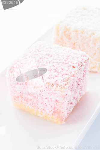 Image of Lamington sponge cakes on white plate