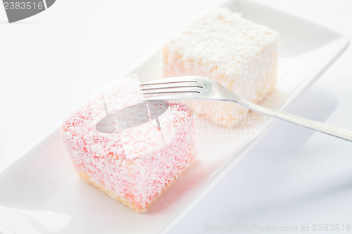 Image of Lamington sponge cakes and fork