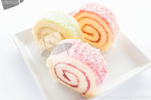 Image of Colorful jam roll cakes  on the dish 