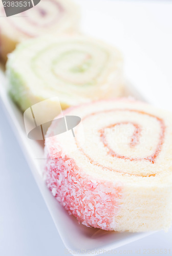 Image of Colorful jam roll cakes  up close