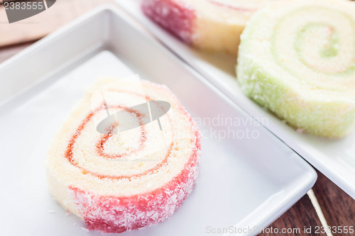 Image of Colorful jam rolls served on white dish