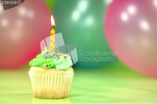 Image of Celebration with Balloons Candles and Cake