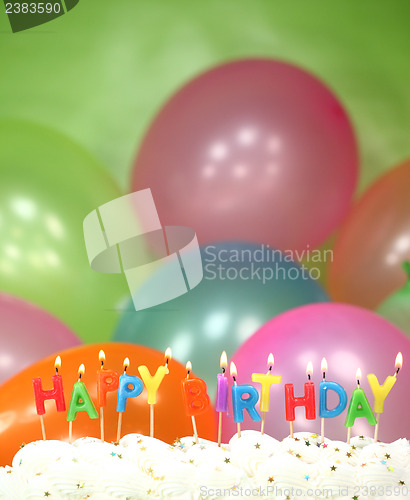 Image of Celebration with Balloons Candles and Cake