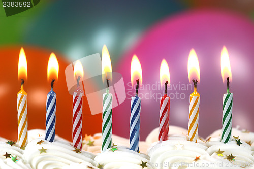 Image of Celebration with Balloons Candles and Cake