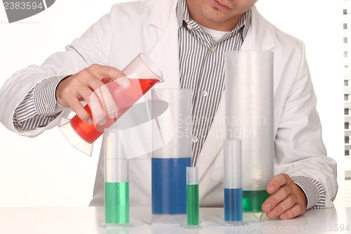 Image of Caucasian Scientist At Work Using the Scientific Method