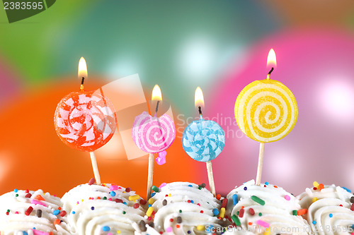 Image of Celebration with Balloons Candles and Cake