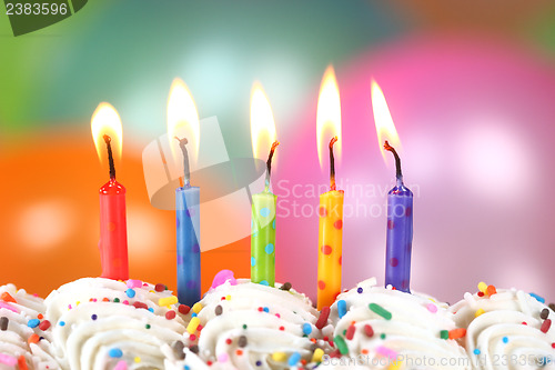 Image of Celebration with Balloons Candles and Cake