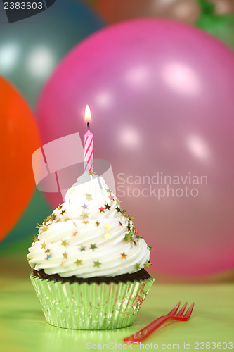 Image of Celebration with Balloons Candles and Cake