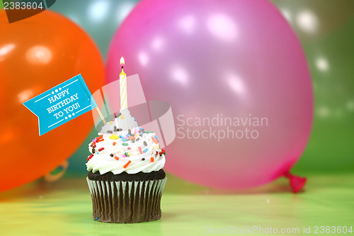 Image of Celebration with Balloons Candles and Cake