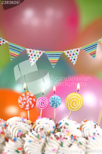 Image of Celebration with Balloons Candles and Cake