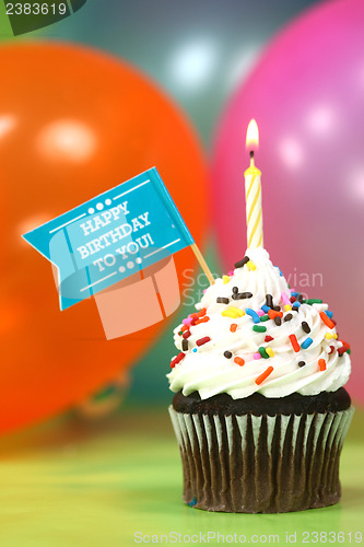 Image of Celebration with Balloons Candles and Cake