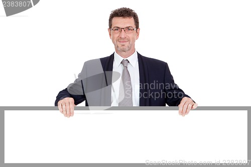Image of mature smiling businessman holding billboard copyspace isolated
