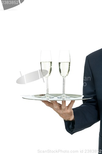 Image of adult male waiter serving two glass of champagne isolated