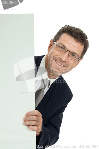 Image of mature smiling businessman holding billboard copyspace isolated