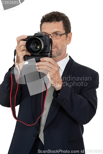 Image of adult man photographer with digital camera dslr isolated