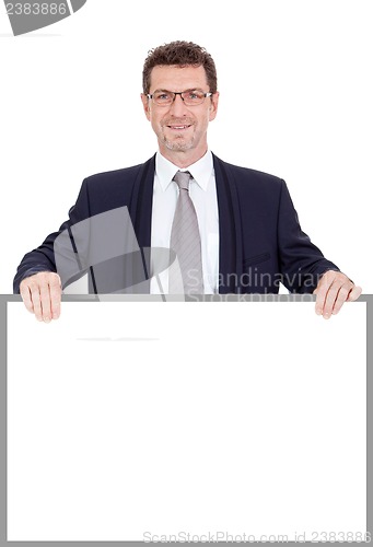 Image of mature smiling businessman holding billboard copyspace isolated
