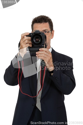 Image of adult man photographer with digital camera dslr isolated