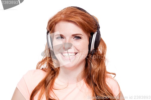 Image of attractive happy woman with headphones listen to music isolated