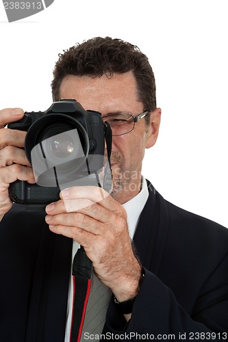 Image of adult man photographer with digital camera dslr isolated