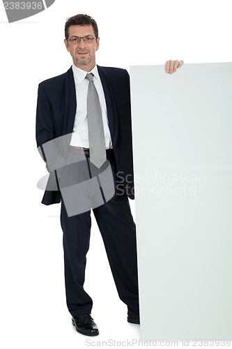 Image of mature smiling businessman holding billboard copyspace isolated