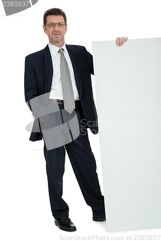 Image of mature smiling businessman holding billboard copyspace isolated
