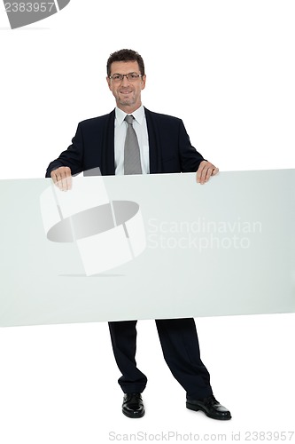Image of mature smiling businessman holding billboard copyspace isolated