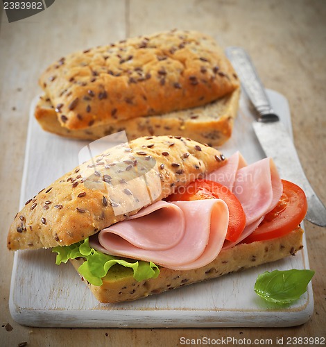 Image of sandwich with ham and tomatoes