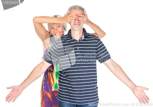 Image of Playful middle-aged couple