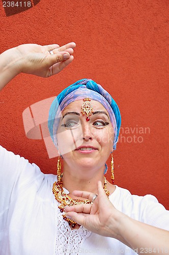 Image of beautiful blond senior woman with Indian jewleries