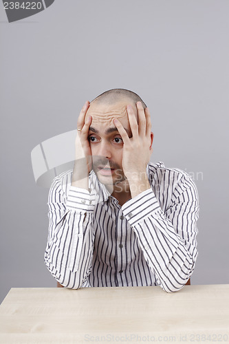 Image of Man at desk