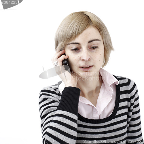 Image of Woman talking on phone