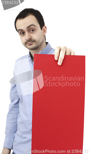 Image of Man holding a paper