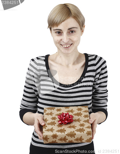 Image of Young woman holding a present