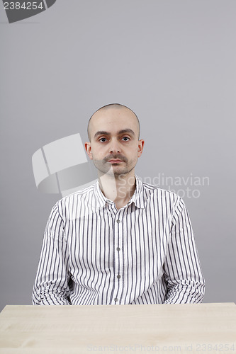 Image of Man at desk