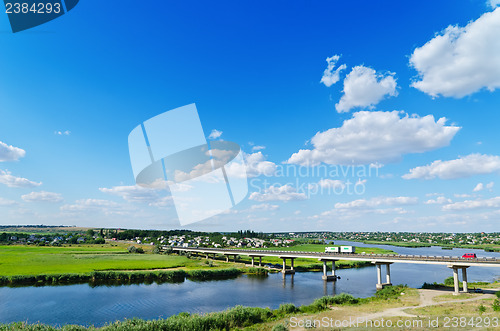 Image of long bridge over river Ingul, Ukraine