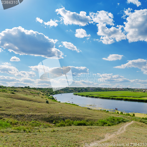 Image of cloudy sky over river