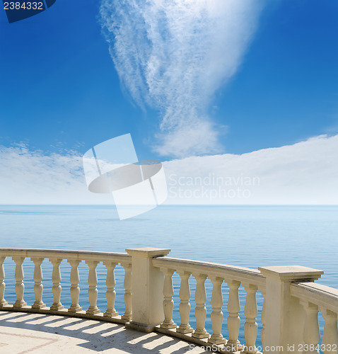 Image of view to the Black Sea from a balcony under cloudy sky