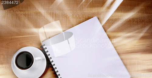 Image of White cup and white page