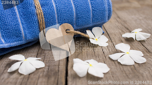 Image of Rolled up towel and paper heart